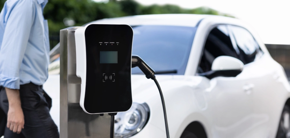 EV charging station in front of an electric car
